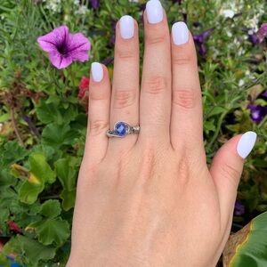NWOT blue crystal bead silver wire ring.